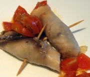 Involtini di pesce spada con pomodori e olive